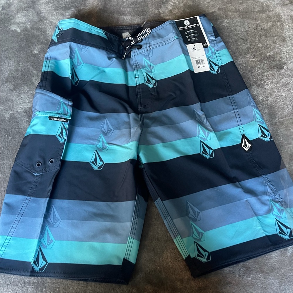 Volcom trunks. Mens size 30. Youth size 18.